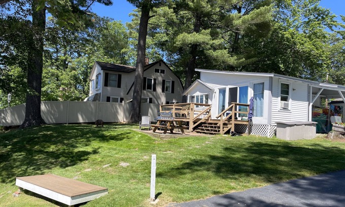 Lochmere Cottage | Lakefront Winnisquam Cottage with dock & boat ramp