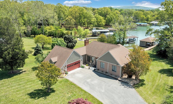 Huddleston House | Lakefront with Private Dock.