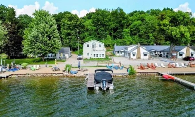 Sand Creek House | Lakeside Beach Getaway with A Gorgeous Kitchen & Dining Room with Room for 10.