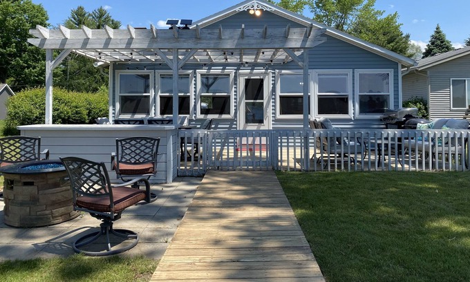 Pierson House | Lakeside getaway! 30 min from GR - Lakefront, kayaks, grill, fire table!