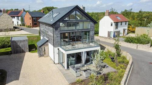Holworth House | Lakeside property with spa access on a nature reserve Beaumont Village 25 BV25
