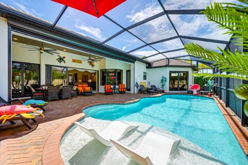 Pelican House | Lanai with Heated Pool at Cape Coral Escape!