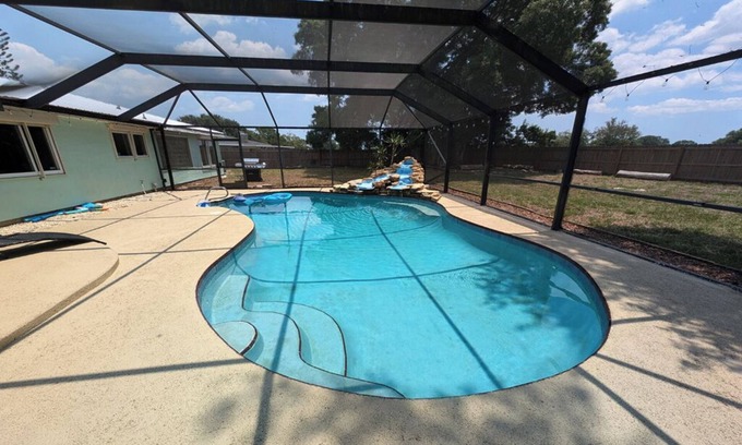 Interchange Square House | Large 4bd 2bth pool home with waterfall feature and private back yard!