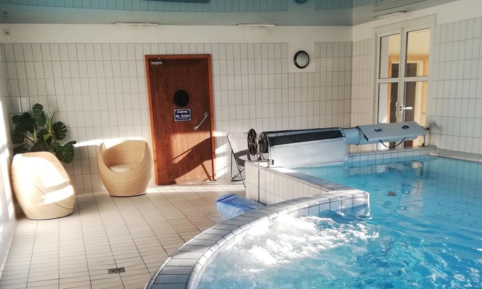 Marciac House | Large cottage **** with heated indoor swimming pool in park in the heart of Marciac