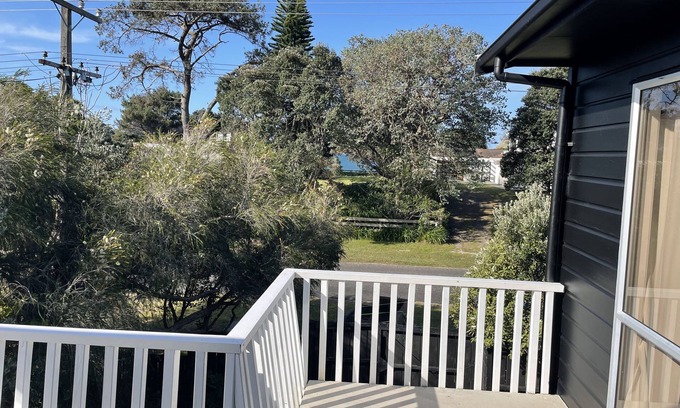 Whangapoua House | Large Cozy Kiwi Bach - 1 minute walk to one of New Zealand’s best beaches