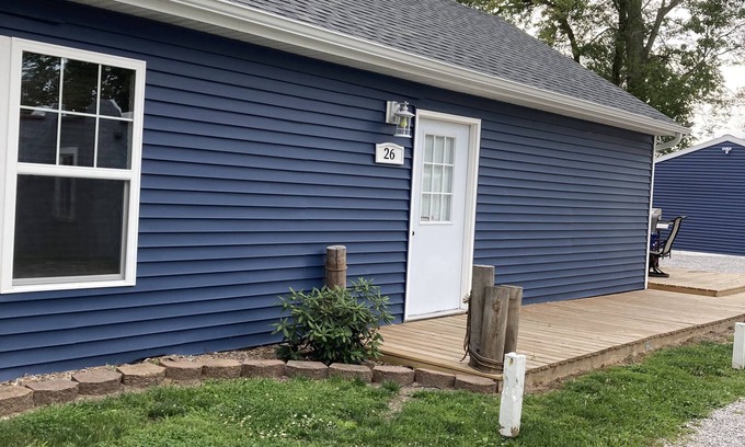 Warsaw Cottage | Large family cottage steps from waters edge.