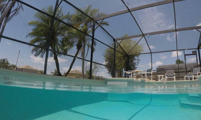 Crescent Lakes Villa | Large Kissimmee Lakeside Villa with South Facing Pool and Spa
