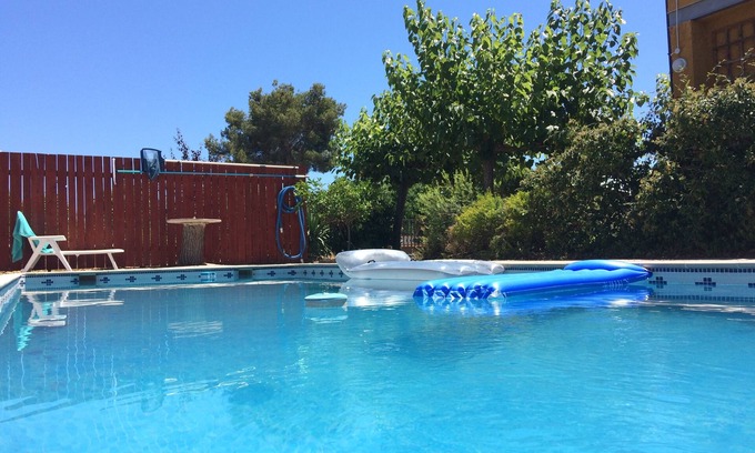 El Catllar Apartment | Large private pool, entire new build cool airy flat, gardens, parking, WiFi