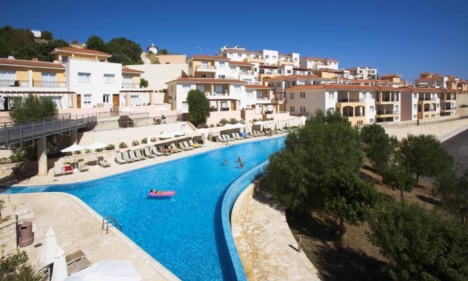 Peyia Town Apartment | Large Terrace, Sea Views, Shared Pool, Free WiFi, UK TV Package, Air Con, Lift