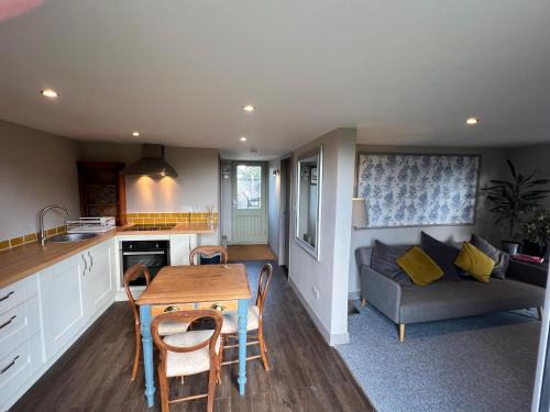 Wicklewood Apartment | Lavender Lodge - Pool and Hot Tub with sunset views over open fields