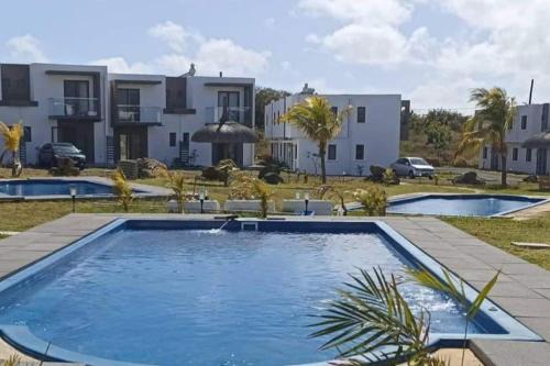 Calebasses Apartment | Le Palmiste lovely 2-bedroom duplex with pool