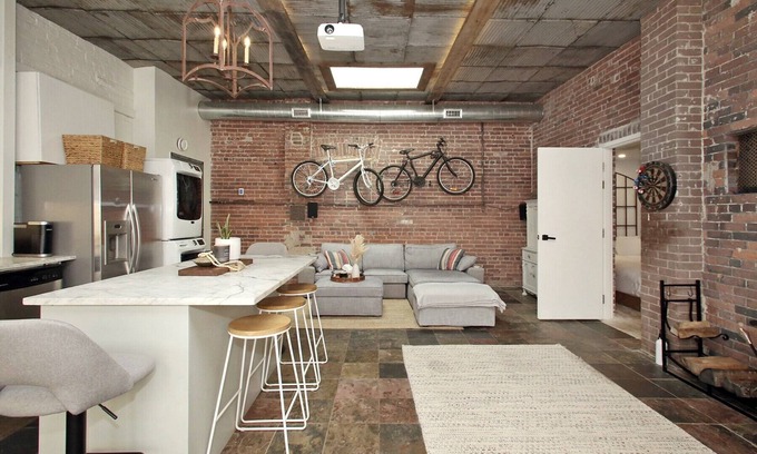 Leslieville Apartment | Leslieville LOFT with Wood Burning Fireplace and Skylights! Parking Included.