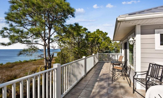 Plantation House | LET YOUR CARES DRIFT AWAY as you watch the dolphins play from the newly expanded beachfront deck.