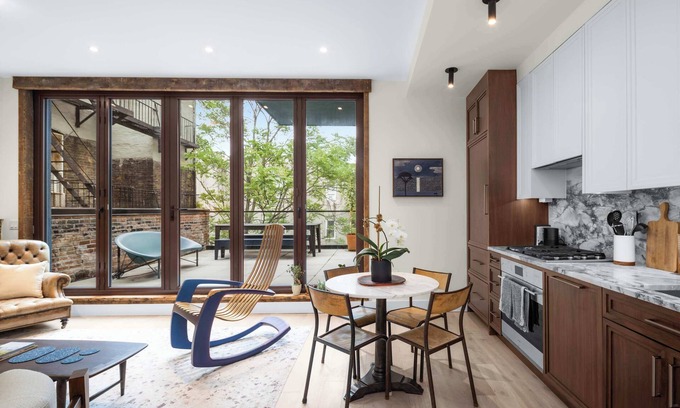 Bowery Apartment | Library Loft by StayHaus | 2BR Full-Service Condo with Terrace