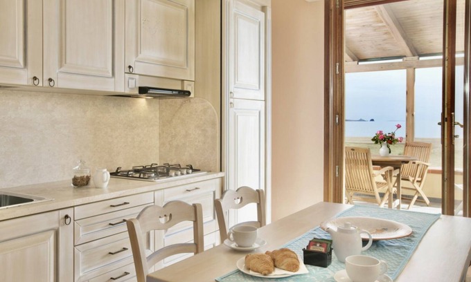Bosa Marina Apartment | Lido Chelo Suite 3 beds sea view