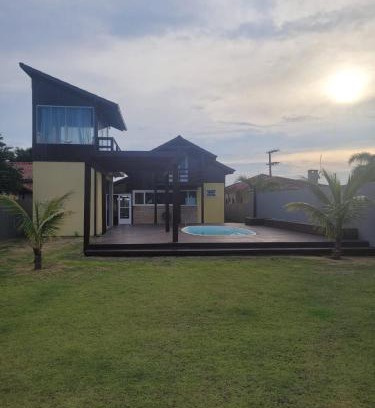 Ibiraquera House | LINDA CASA COM PISCINA DE FRENTE PARA A LAGOA