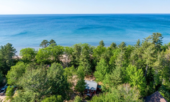 Marquette Cabin | Little Red Retreat: Lake Breezes & Cozy Nights – Summer's Calling