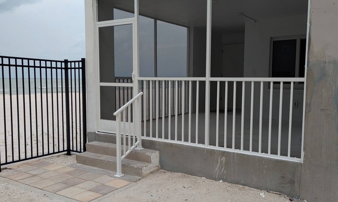 Moorings House | Live right on the sand!