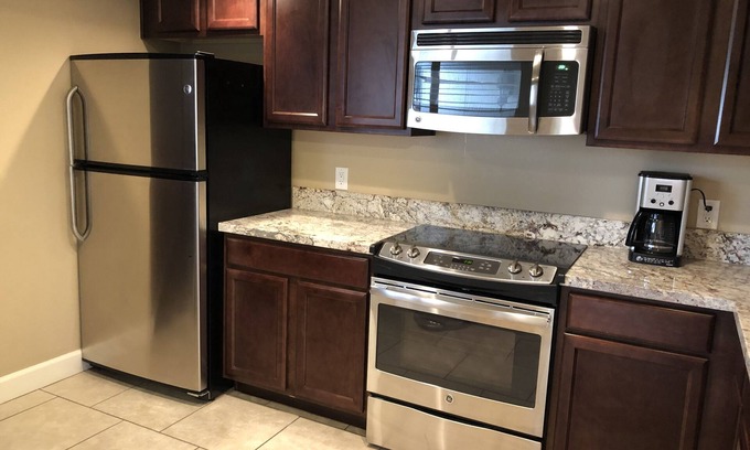 Villa Green Condo | LOCATION, LOCATION, LOCATION! WALKING DISTANCE TO THE NEW GLOBAL AMBASSADOR!