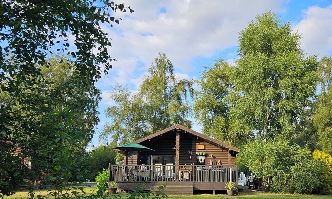 Tattershall Cabin | Lodge overlooking fishing lake. Hot tub & fishing peg