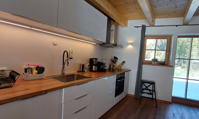 Enzingerboden Ski Chalet | Lodge Seeblick 161 am Skilift und Bergsee für 5 Pe