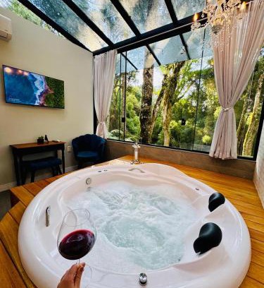 Carniel House | Loft com Hidromassagem