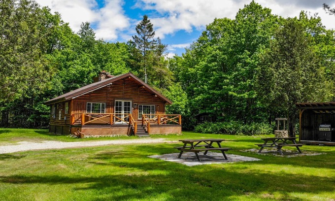 Saint-Raymond Ski Chalet | Log cabin located on a private island.