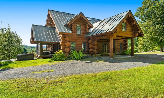 Hartland Four Corners House | Log manor on 65 private acres of land with entertaining amenities & hot tub