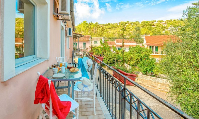 Longos Apartment | Loggos Haven: Chrisoula's upper-floor escape. Modern comforts, short walk to beaches.