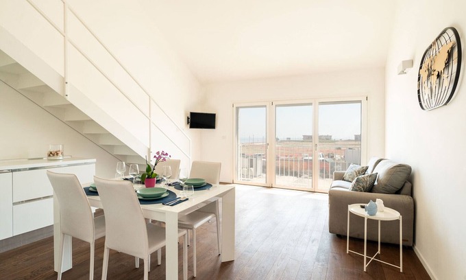 Municipio 1 Apartment | Lolita's Beachfront Loft by Wonderful Italy