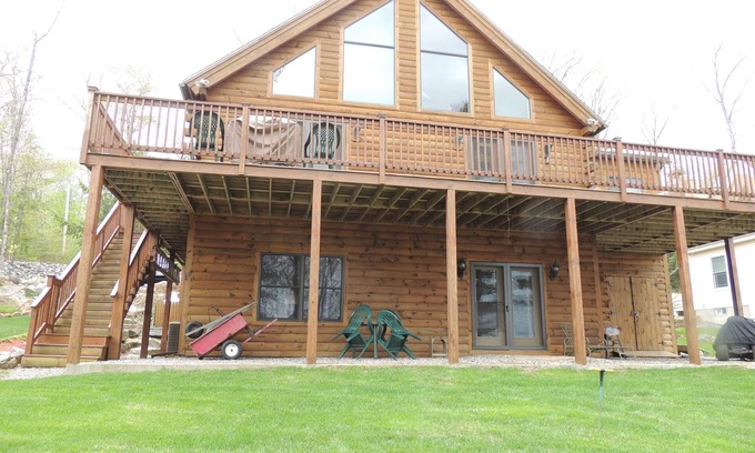 Naples House | long lake sandy entrance private dock on mast cove.