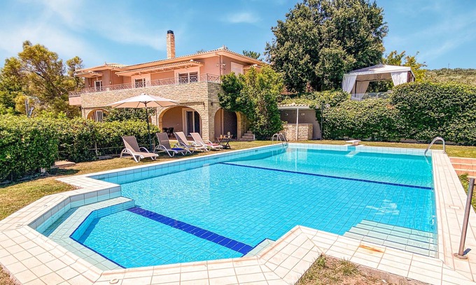 Lokroi House | Look forward to a breathtaking view from the sunny terrace of this vacation home with pool!