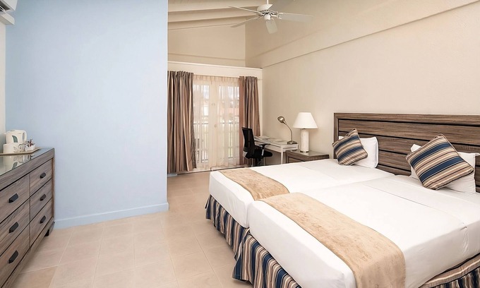 St. Lawrence Gap Hotel | Look No Further! Outdoor Pool, Free Parking, Steps Away from Dover Beach!