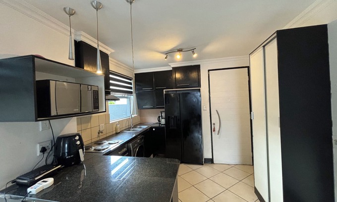 Greater Johannesburg Metropolitan Area House | Lovely 2-bedroom townhome with WiFi and Backup Power