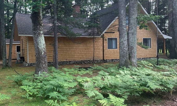 Rapid City House | Lovely 3-bedroom house on Rapid River with easy access to Torch Lake sandbar!