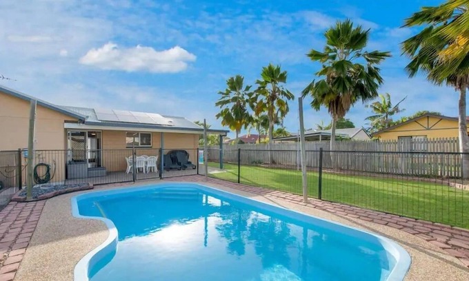 Mount Louisa House | Lovely 3BR home surrounded by lush greenery. Perfect escape for tranquility.