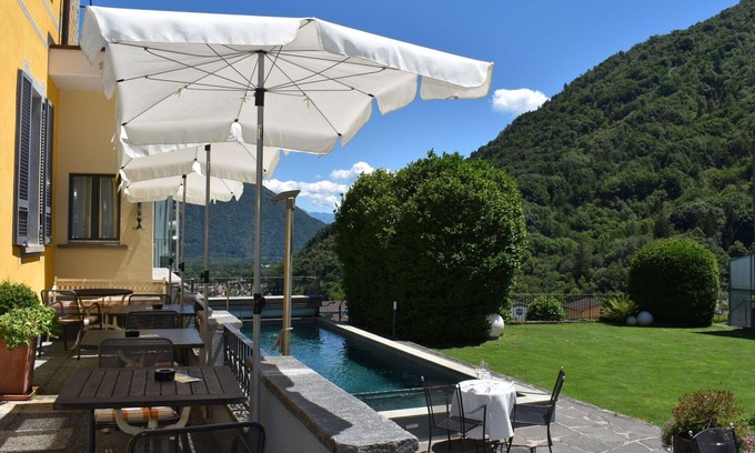 Golino Apartment | Lovely apartment for 4 people with WIFI, pool, TV, patio, pets allowed, panoramic view and parking