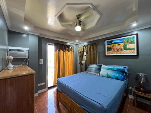 Lila Bed & Breakfast | Lovely Bedroom in Lila, Bohol with WIFI, AC and Ref