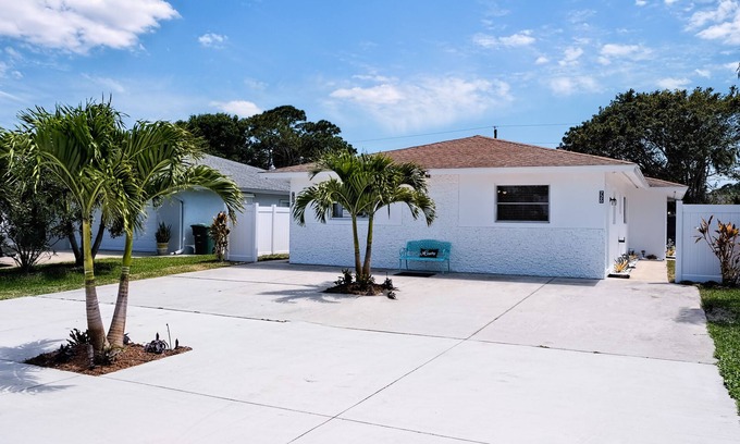 Naples Park House | Lovely dog-friendly duplex near Gulf with enclosed yard, central AC, & W/D