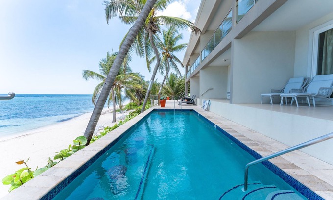 Bodden Town Condo | Lovely Ocean Front Sea Palm Villa #2