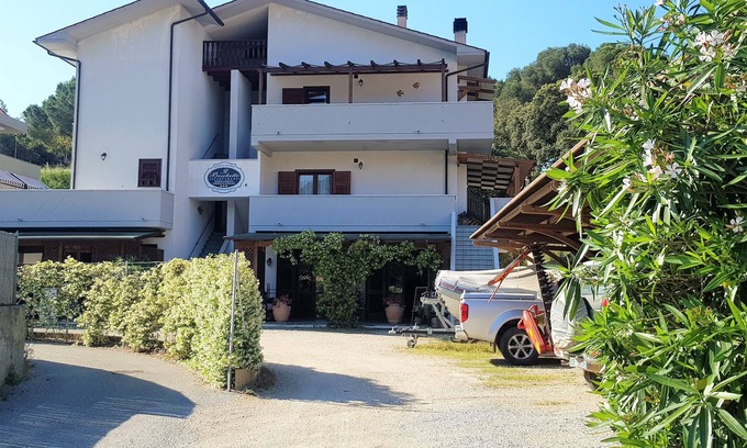 Porto Azzurro Apartment | Lovely one-bedroom apartment with terrace and parking space a few steps from the center