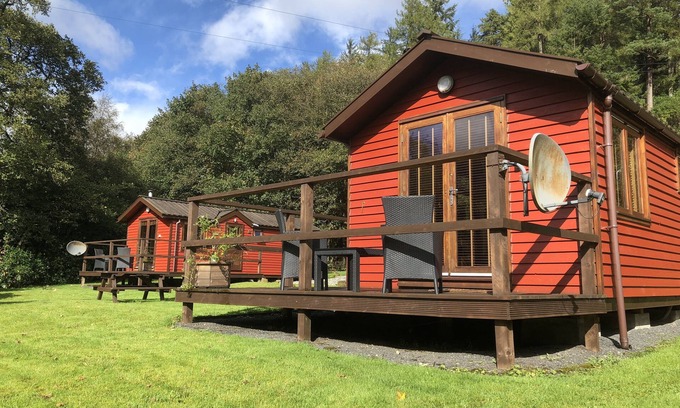 Rashfield Cabin | Lovely Riverside Lodge for two, by romantic Pucks Glen in the Argyll Forest Park