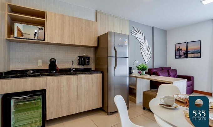 Caminho das Arvores Apartment | Lovely Suite Compact Kitchen in Central Region