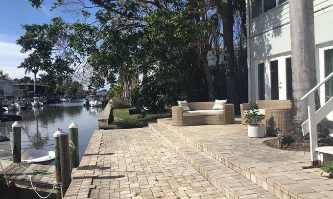 Royal Harbor Condo | Lovely Two bedroom/Two bath Main Floor on the canal to Naples Bay! Pet friendly