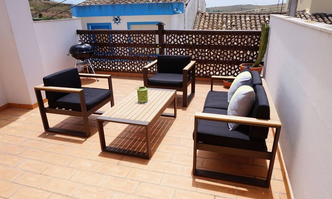 Raposeira House | Lovely village house close to many beaches. Large private sunny roof terrace.