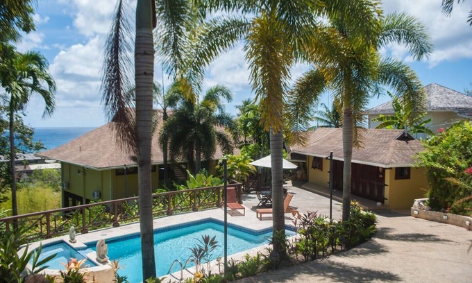 Black Rock Villa | Luciana: Light & Airy Home with Windows for Walls & Caribbean Open Plan Living