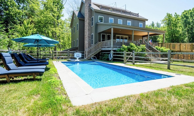 Miami Park House | Luxe family-friendly lake house-hot tub, heated pool, great golf nearby, & more!