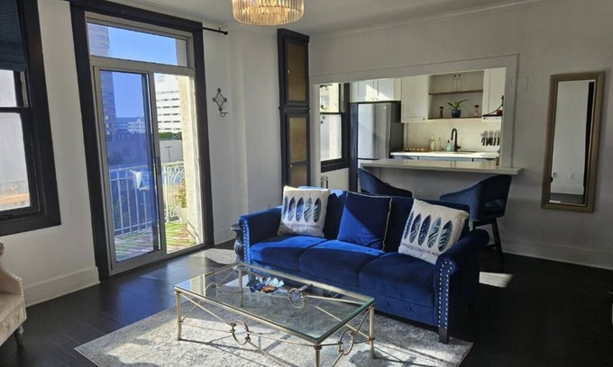 Downtown Long Beach Condo | Luxe Suite one bedroom with free parking, balcony and partial ocean view.