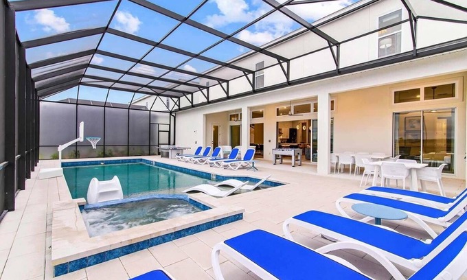Loughman House | Luxe Villa w/Golf Simulator, Builder BR, Theater, Game Loft & Gym - Near Disney