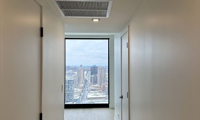 Downtown Montreal Apartment | Luxurious Condo located with the front row views of the Place des Festivals.n